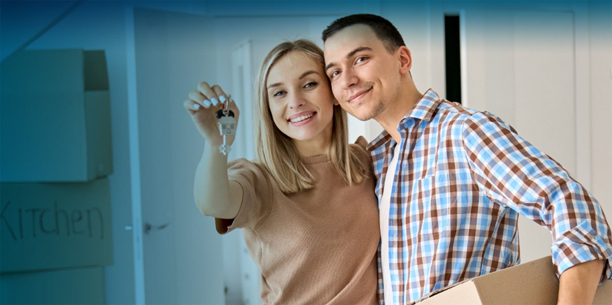 Man and woman smiling after moving in